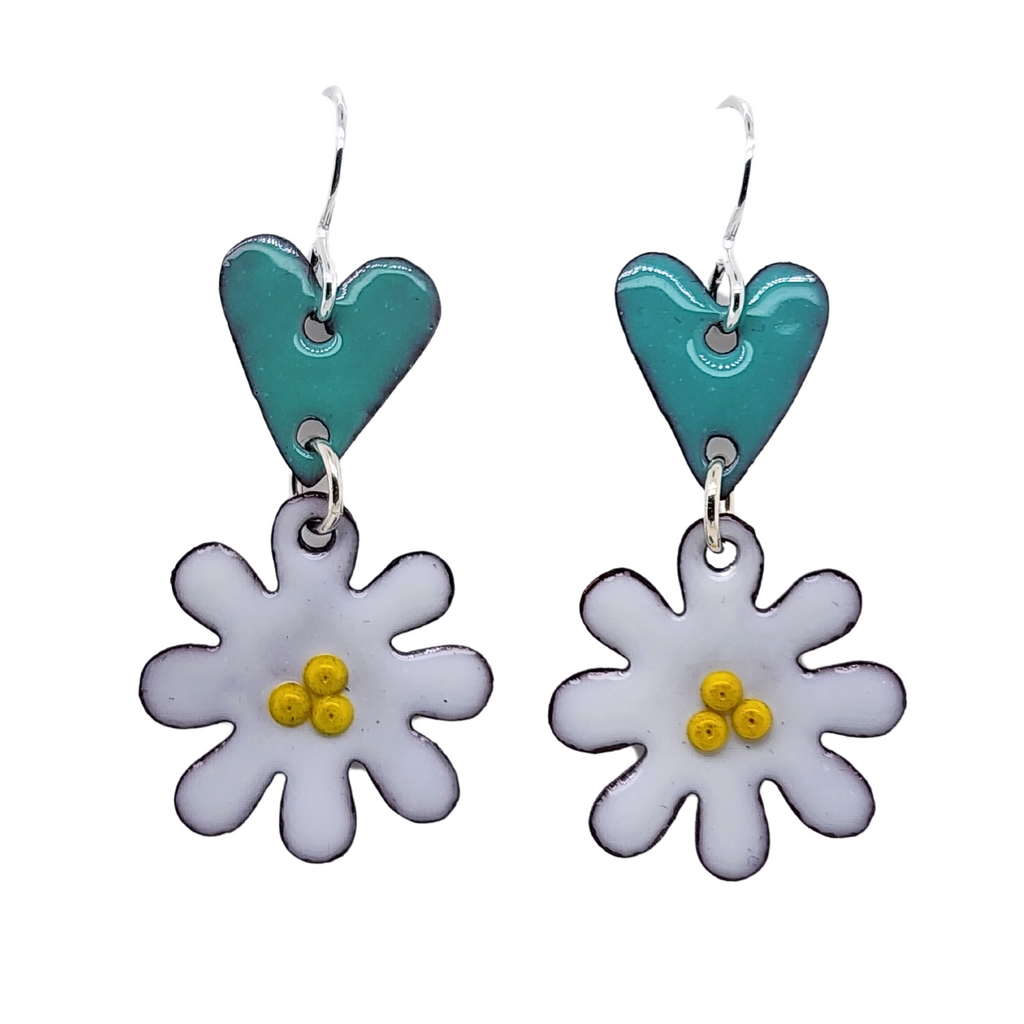 white daisy flowers with yellow centers hang below turquoise hearts