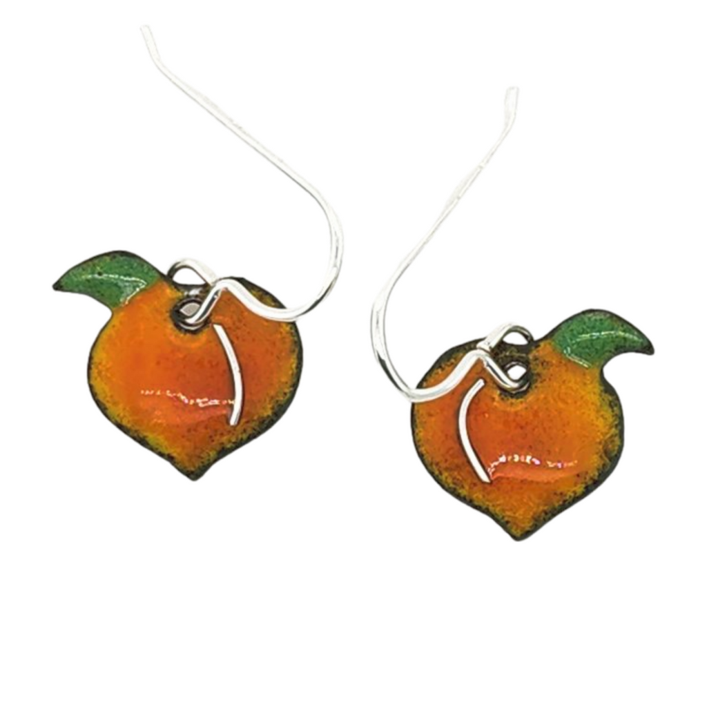 fused glass earrings in the shape of peaches