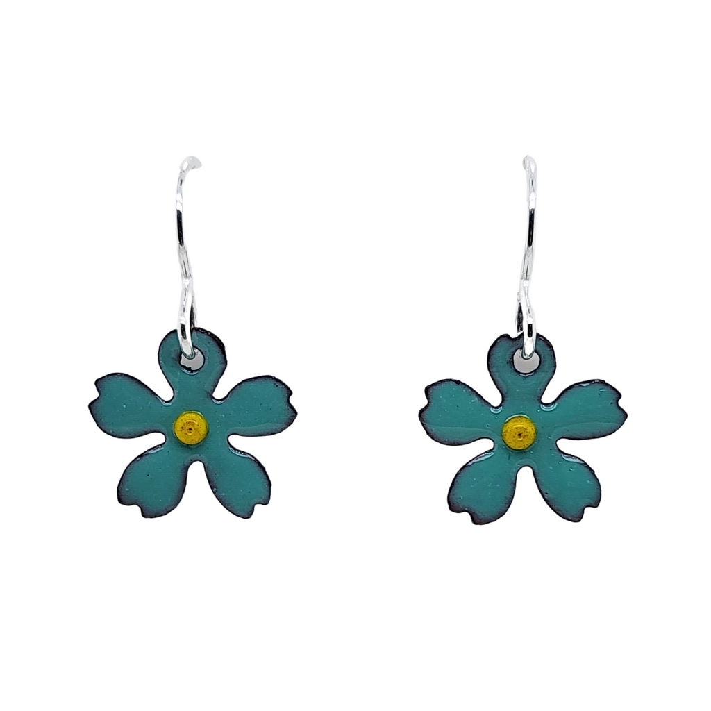 turquoise flowers with yellow centers