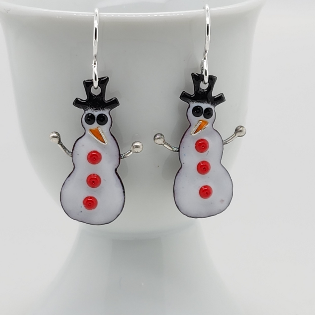 small snowmen earrings made from enamel