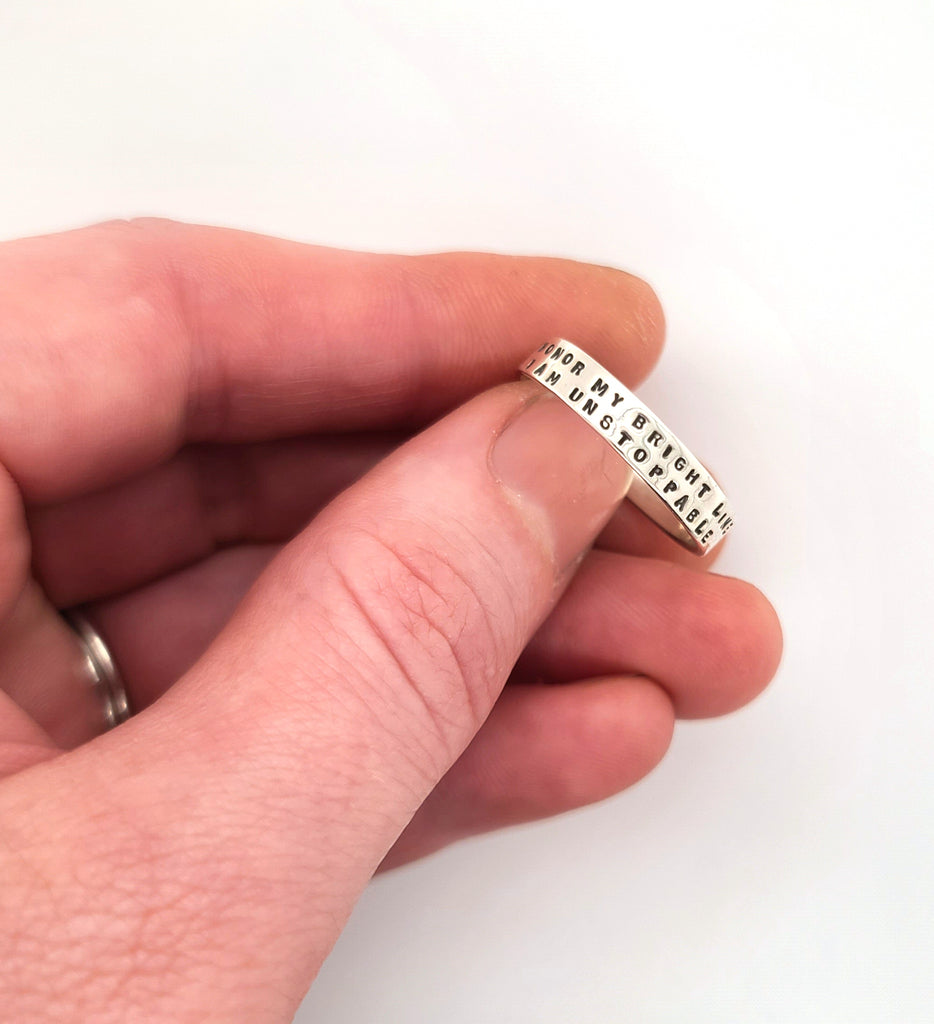 4mm wide sterling silver ring with lettering