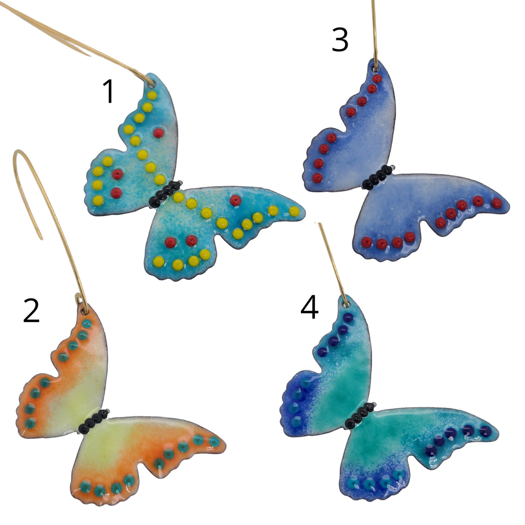 4 butterflies all with different color patterns