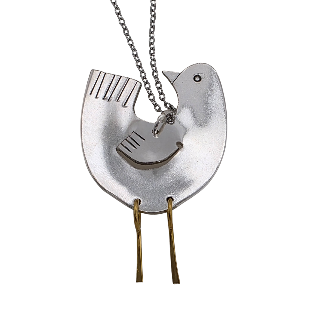 Silver bird-shaped pendant on a chain against a white background
