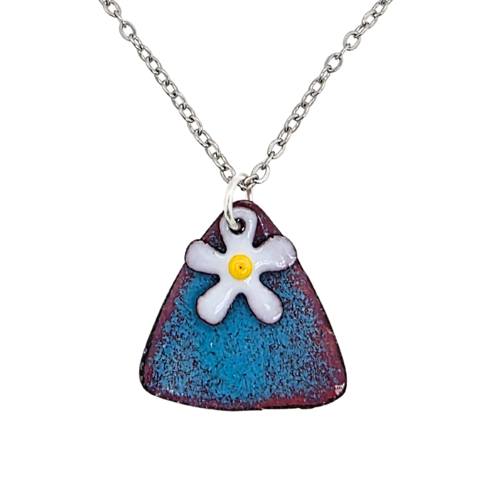 Necklace with a unique pendant featuring a white flower with a yellow center on a blue and purple background.  Artisan made by Kathryn Riechert in Savannah, GA USA