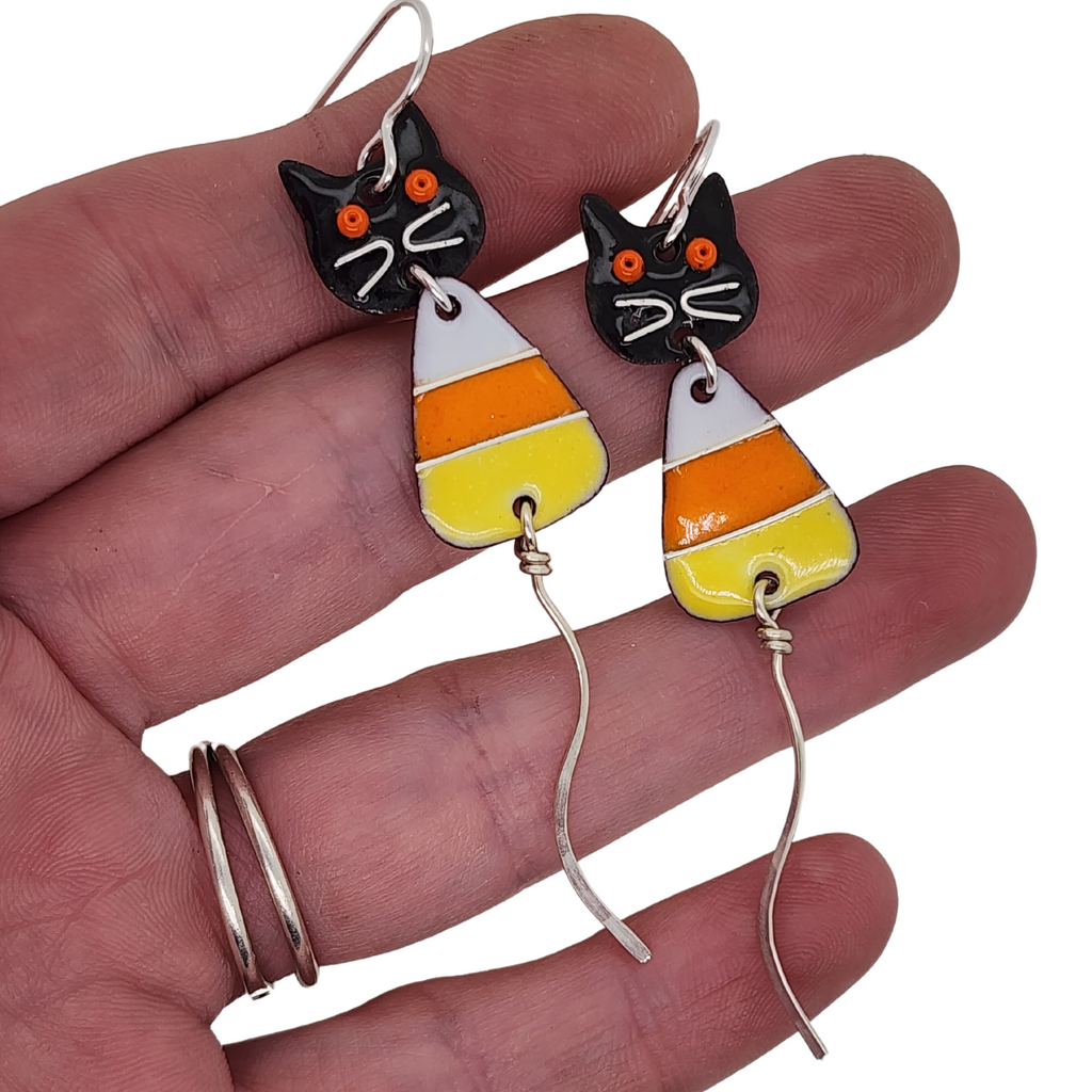 whimsical earrings made of glass enamel