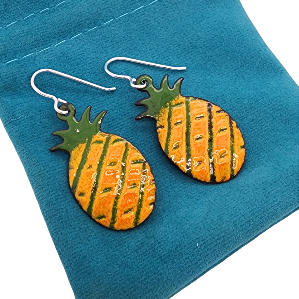 glass fruit earrings shaped like pineapples