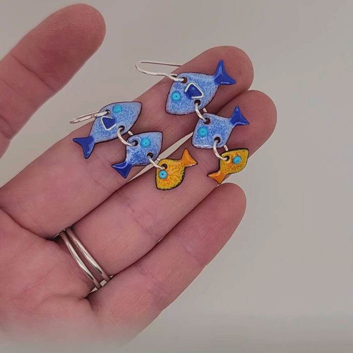 fish earrings in a video to show movement