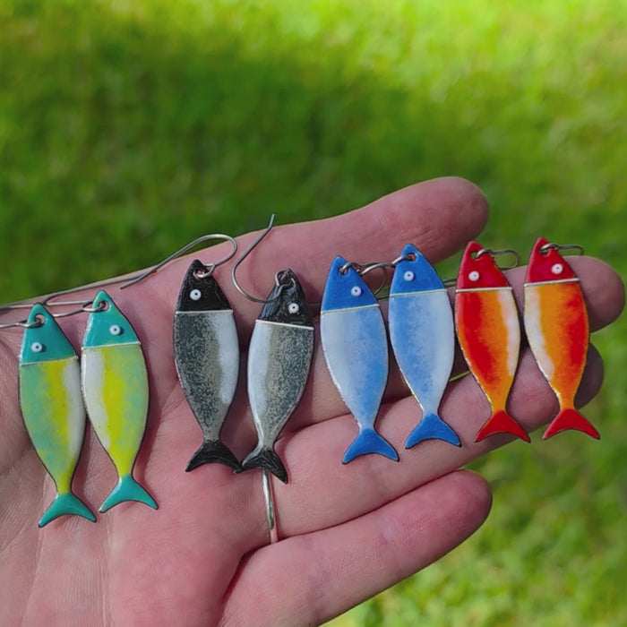 video of handmade glass enamel fish earrings  Handmade by Savannah, GA artist Kathryn Riechert