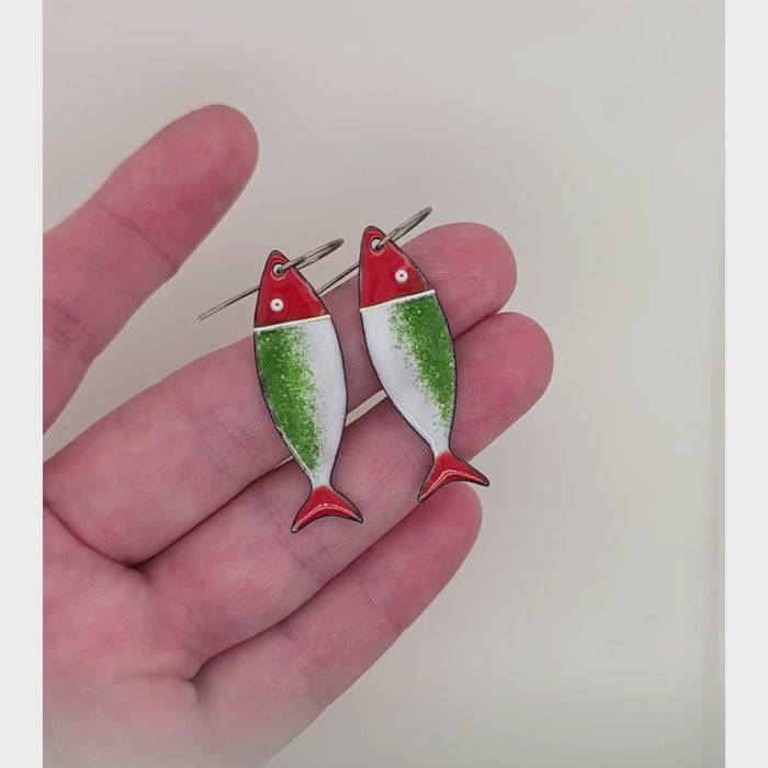 Christmas earrings with a fish shape handmade by Kathryn Riechert.