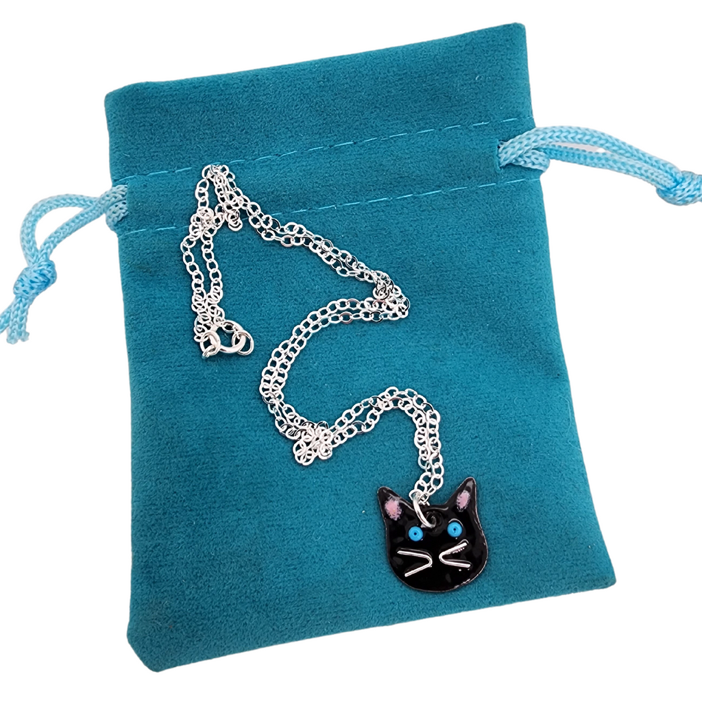cat necklace on a gift pouch, handmade by Kathryn Riechert