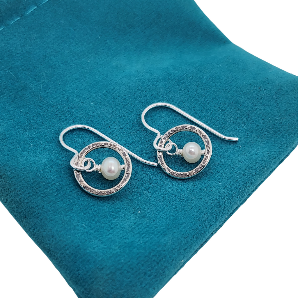handcrafted silver earrings with white pearls