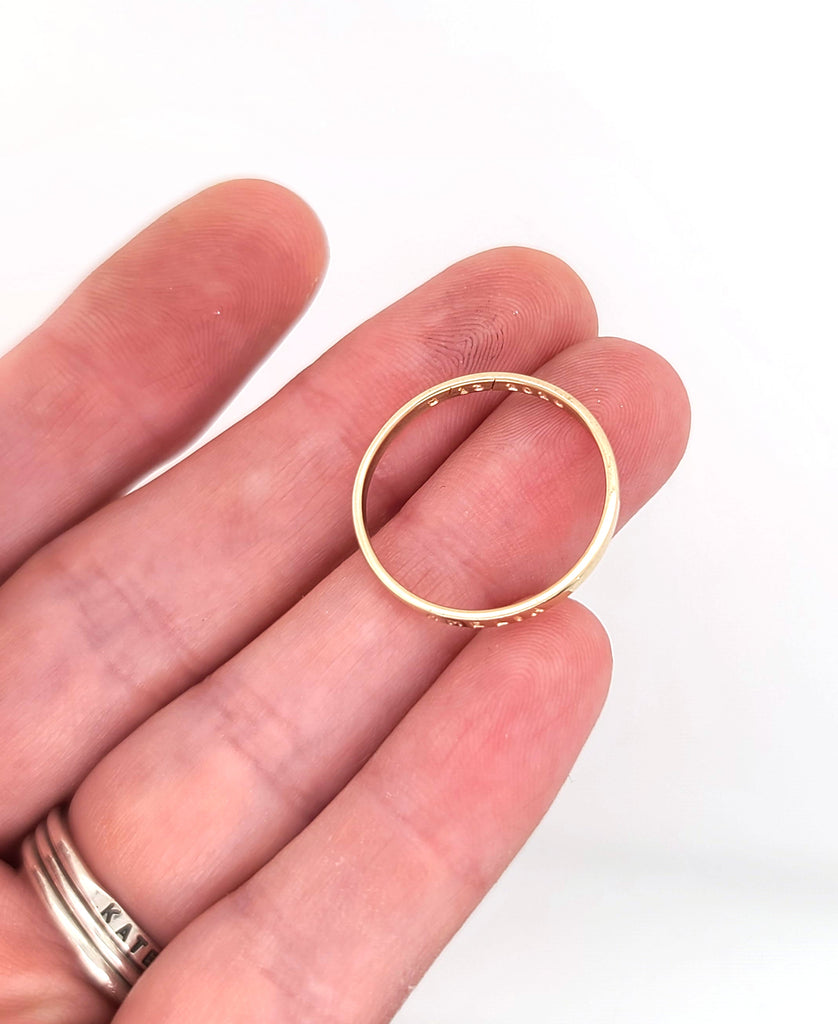 small gold ring by Kathryn Riechert