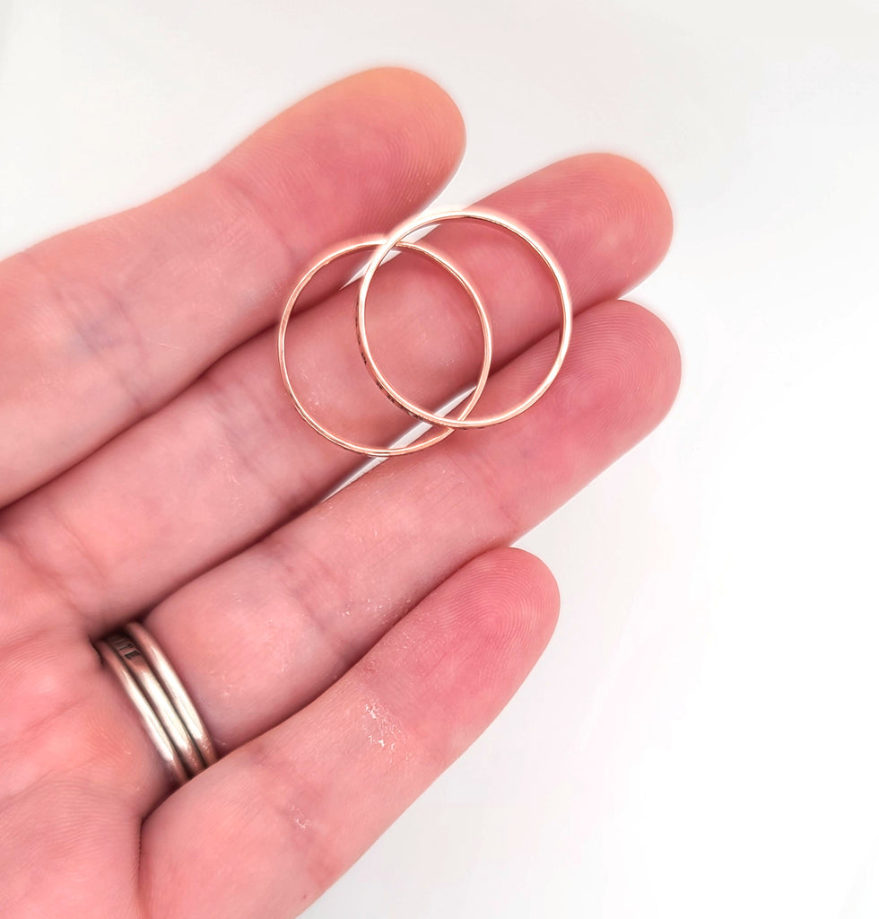 thin copper rings by Kathryn Riechert