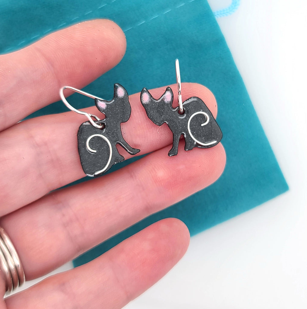 gray sphynx cat earrings by Kathryn Riechert