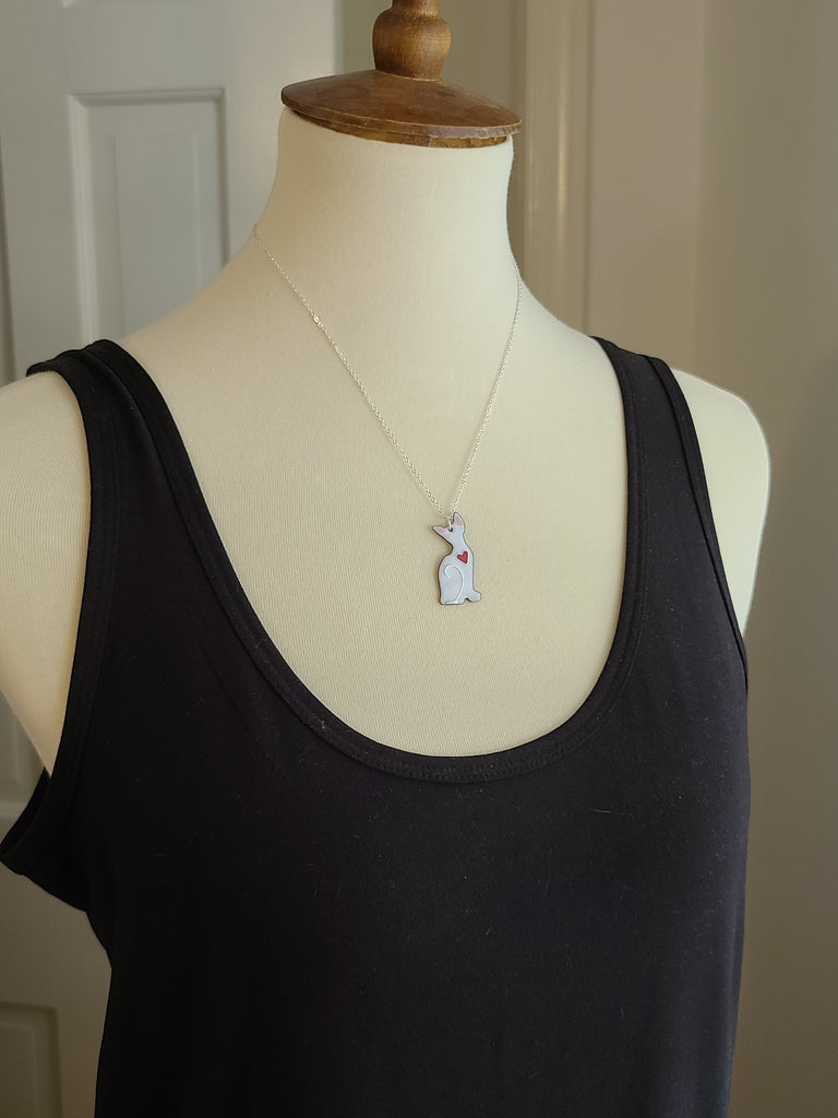 white sphynx cat pendant with heart