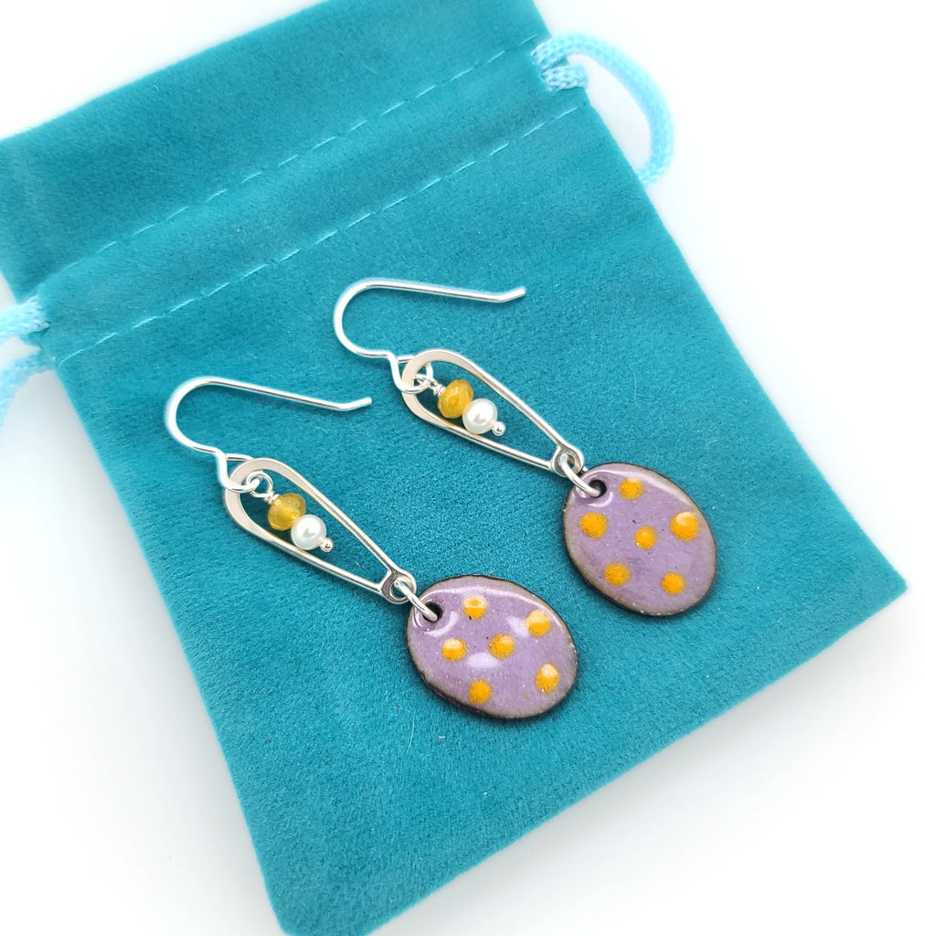 purple and yellow earrings with pearls