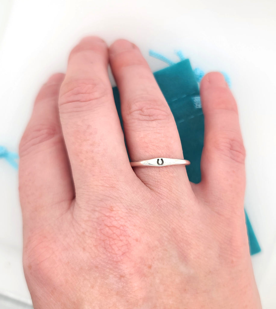 handstamped ring with horseshoe design