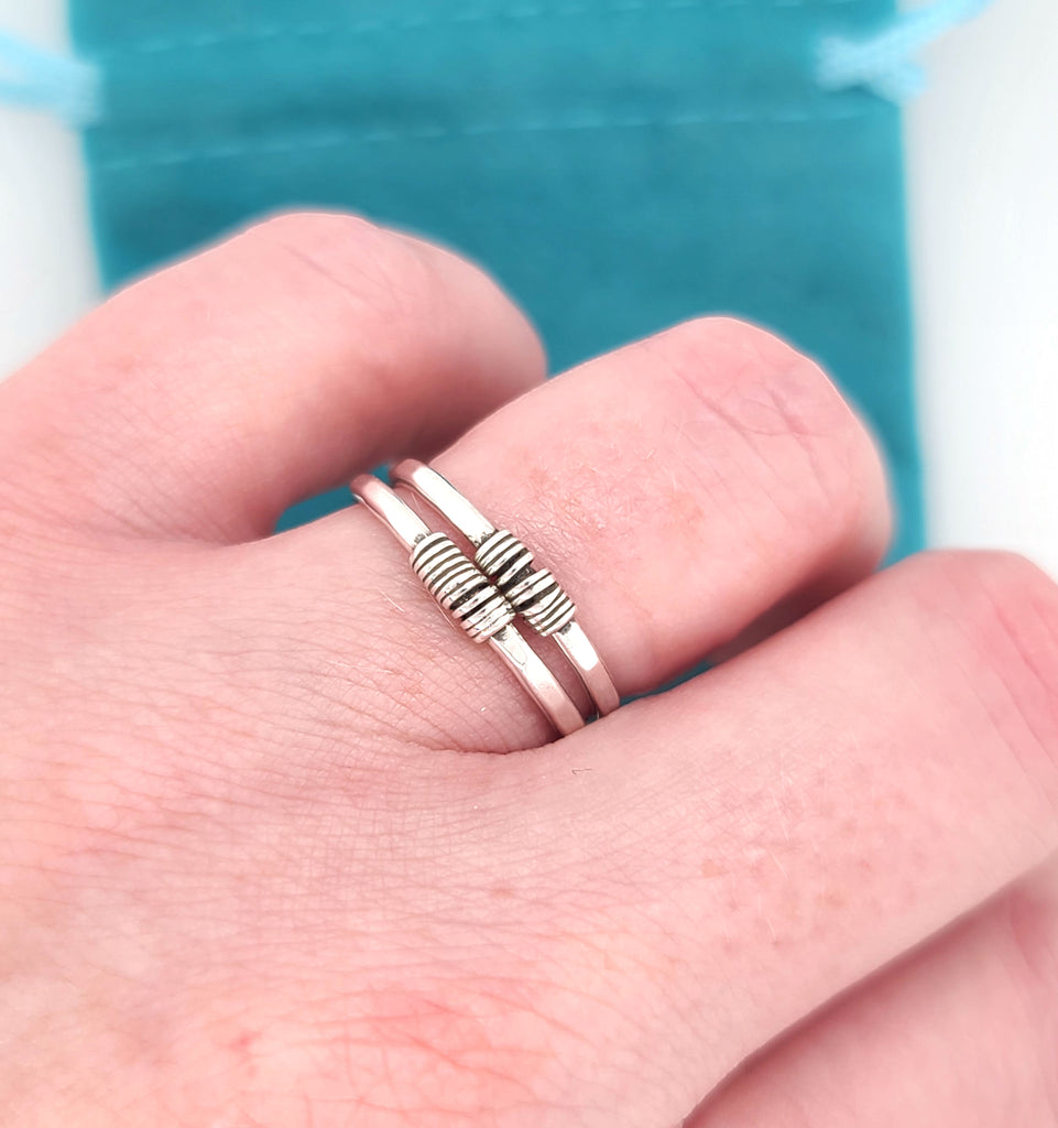 two stacking rings with wrapped wire