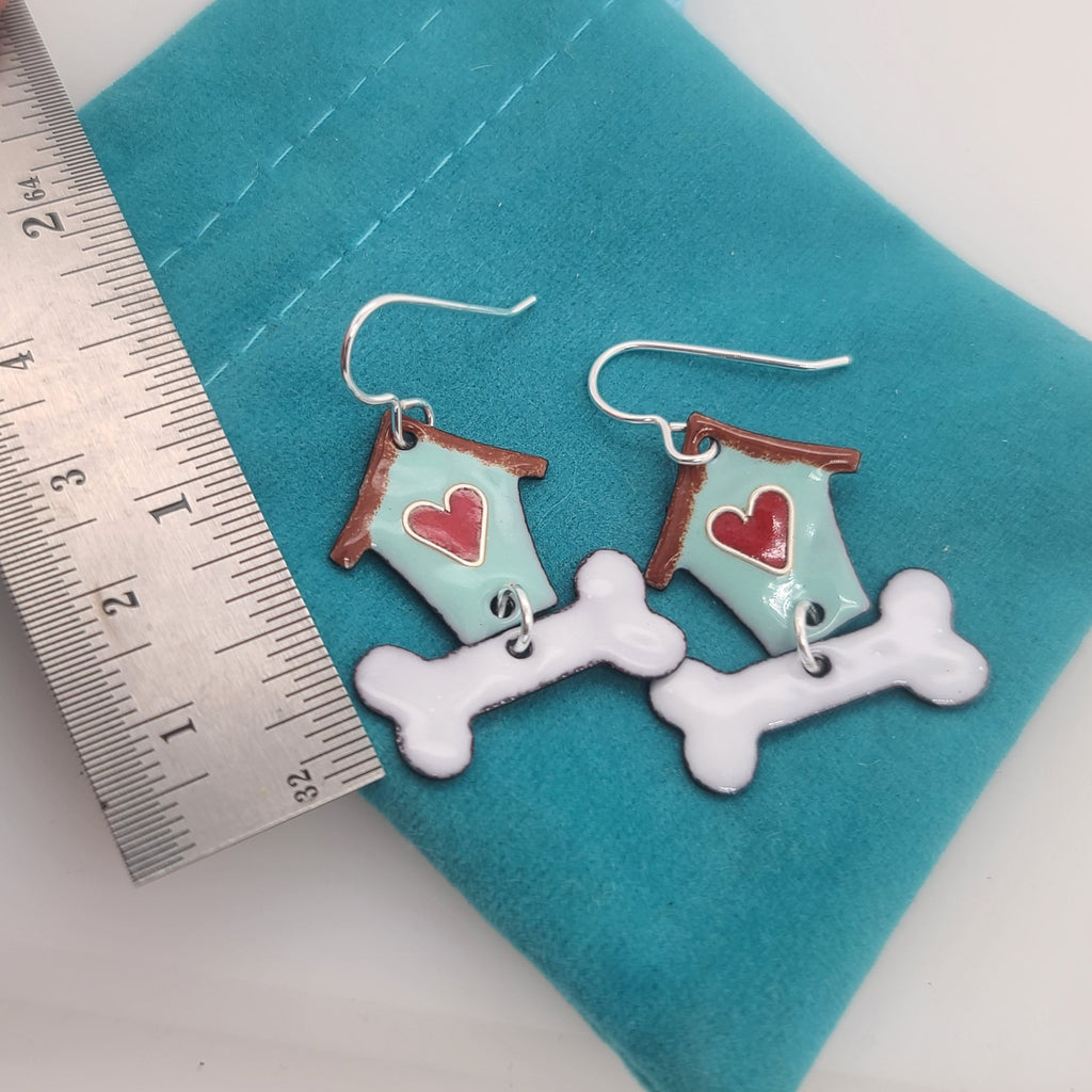 earrings next to a ruler