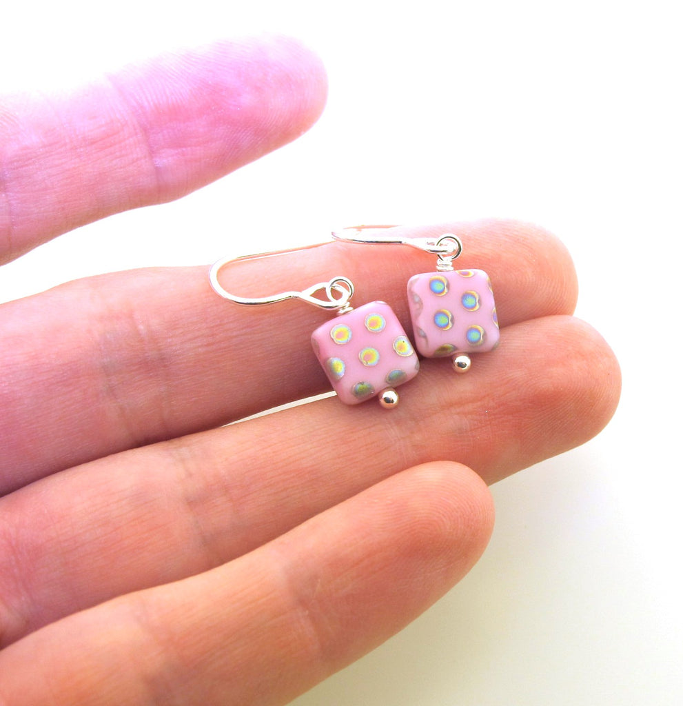 pink square earrings with dots