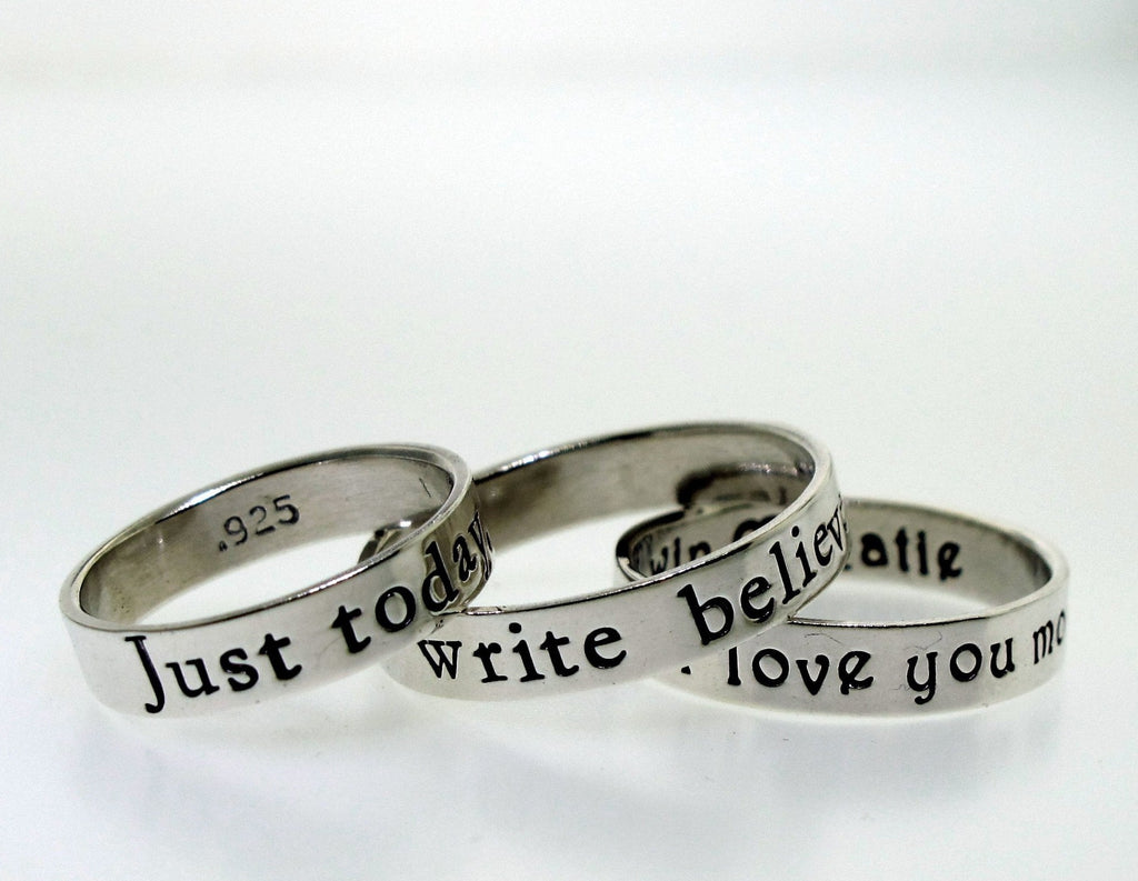 inspirational words on handcrafted silver rings by kathryn riechert jewelry