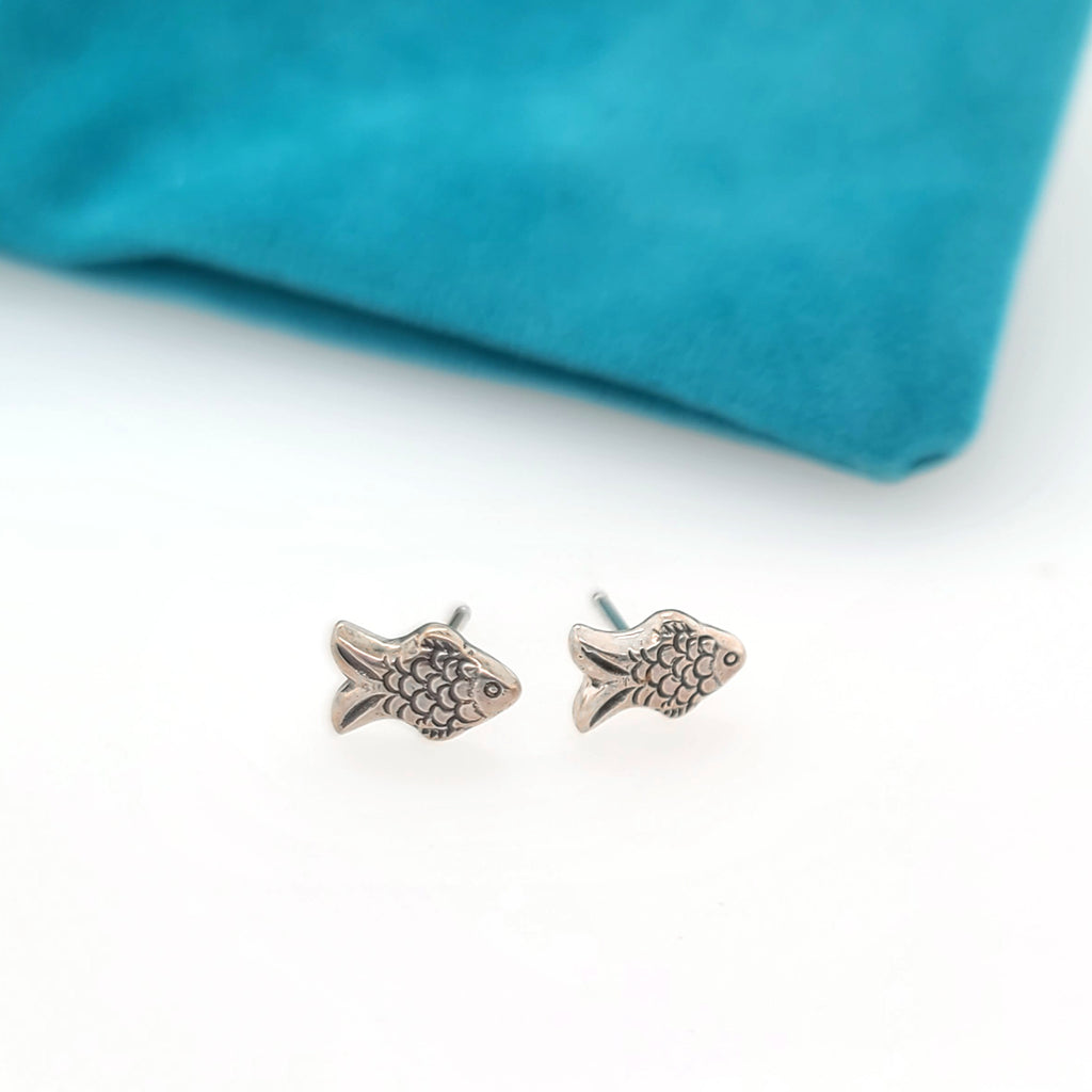 tiny stud earrings shaped like a fish
