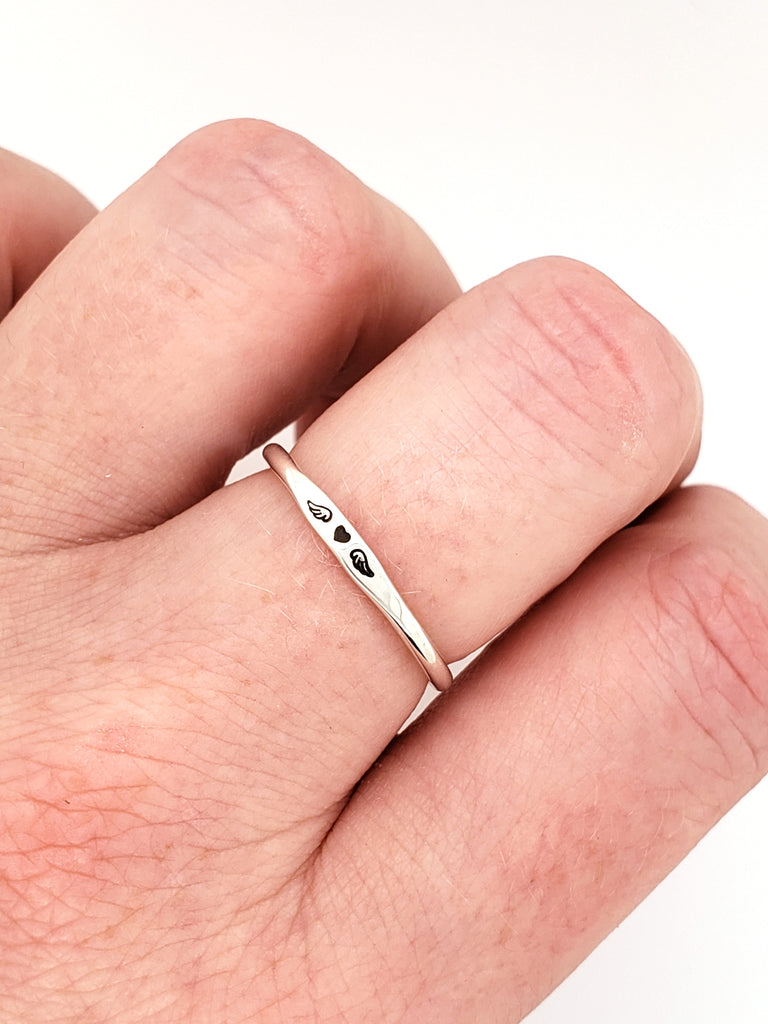 tiny ring with stamped heart